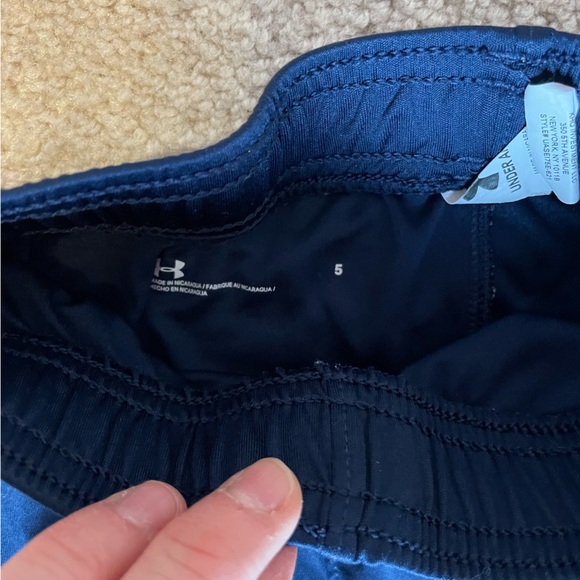 Size 5 boys under armour shorts. Navy with red piping. - Picture 3 of 3